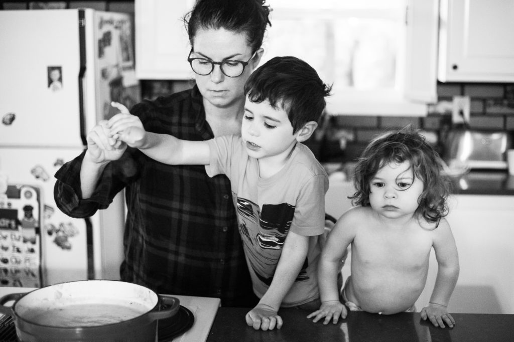 family of four making butternut squash soup