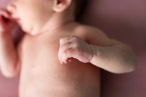 Close up detail photo of newborn babies hand.