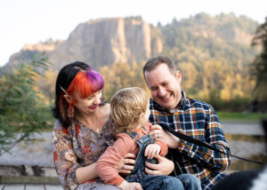 Family hugging together in the Columbia River Gorge | Things to do in portland with kids 