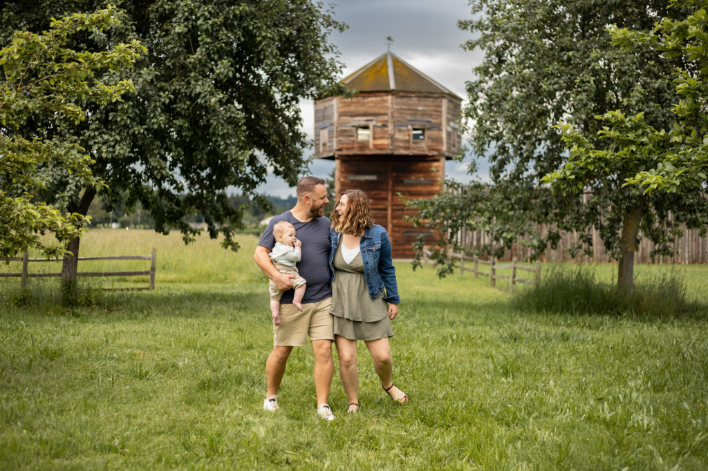 family walking through Fort Vancouver site in spring 