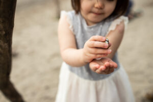 Photo of little girls hands with shells in the Columbia River Gorge