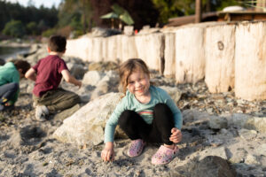 Little girl playing on the beach. things to do in Orcas Island.