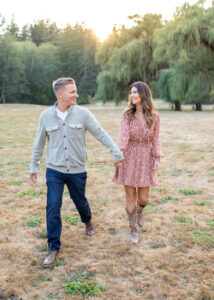 A husband and wife are walking during sunset in a gorgeous park near Portland, Oregon. Portland photographer mini session. 
