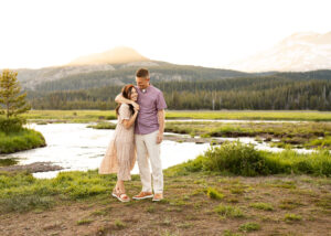 Father and daughter hugging in Sparks Lake area near Bend, Oregon.