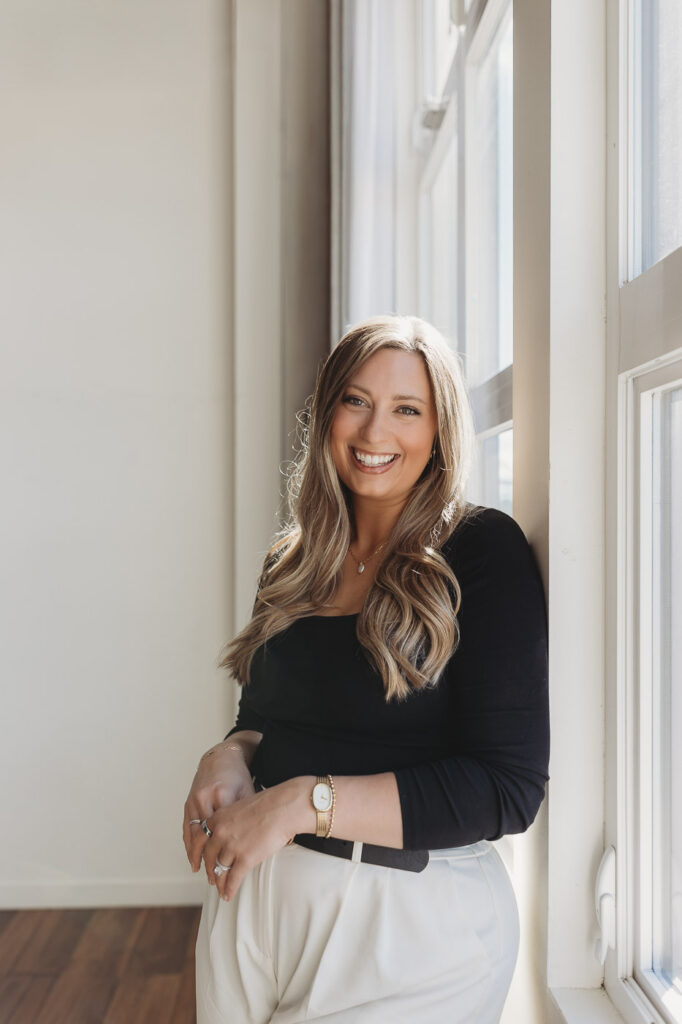 female entrepreneur getting modern headshots in a portland oregon photo studio that is in a blog about if brand photos are worth it for a small business.